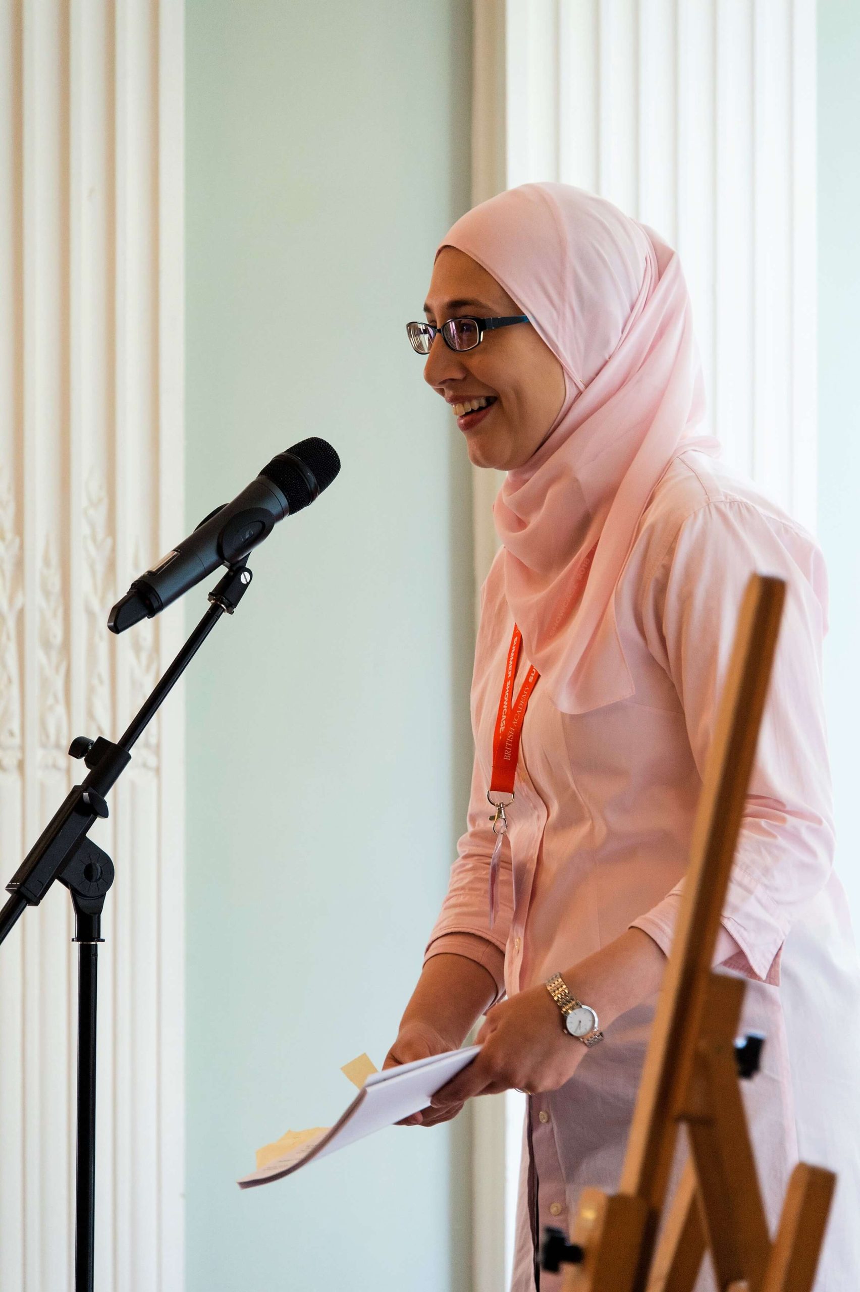 Asma in front of mic